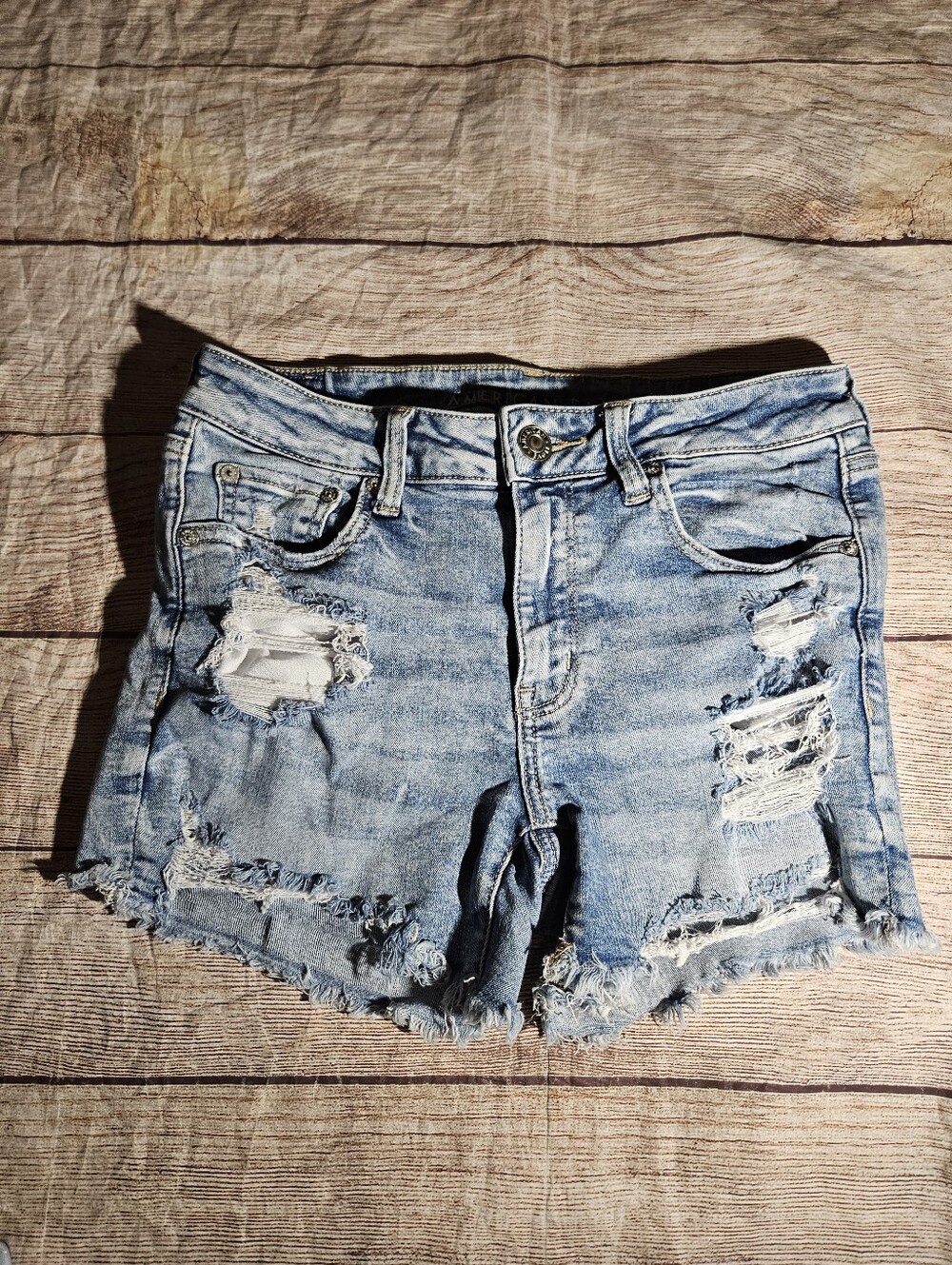 American Eagle light blue distressed midi jean shorts